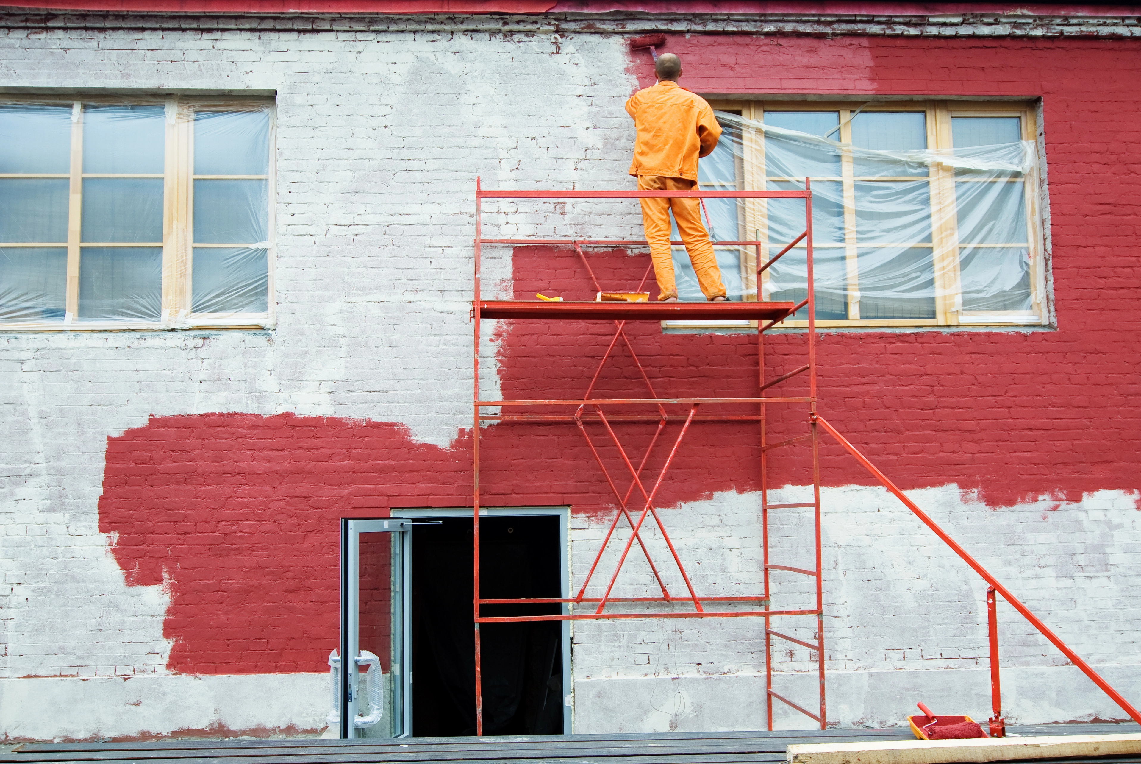 engineer-woman-is-pointing-for-project-manager-to-see-building_t20_axQ2rp